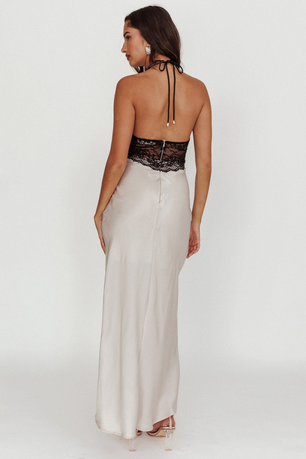 < img src="https://www.berynea.com/" 
       alt="Black Lace Deep V-Neck Satin Maxi Backless Dress" 
       loading="lazy" />