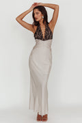 < img src="https://www.berynea.com/" 
       alt="Black Lace Deep V-Neck Satin Maxi Backless Dress" 
       loading="lazy" />
