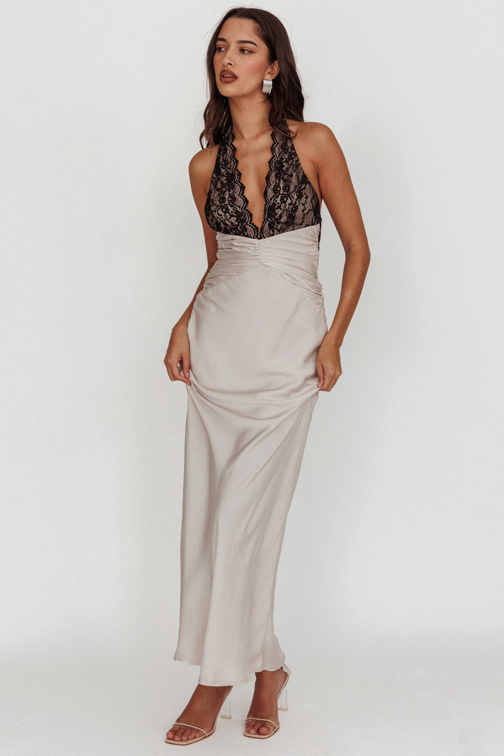 < img src="https://www.berynea.com/" 
       alt="Black Lace Deep V-Neck Satin Maxi Backless Dress" 
       loading="lazy" />