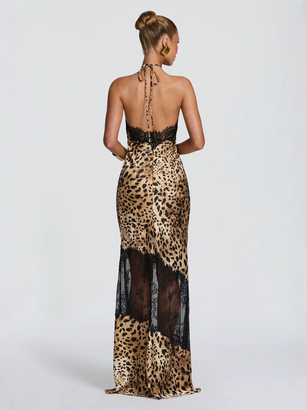 <img src="https://www.berynea.com/" 
       alt="Leopard Print Lace Backless Circus Dress" 
       loading="lazy" />