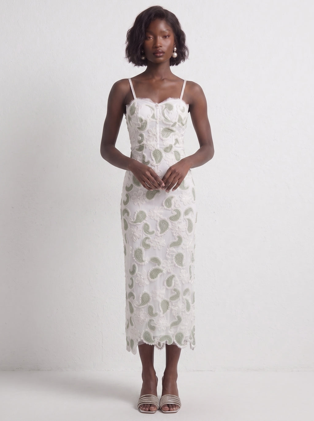 <img src="https://www.berynea.com/" 
       alt="  Spaghetti Strap Embroidered Lace Midi Dress 
       loading="lazy" />