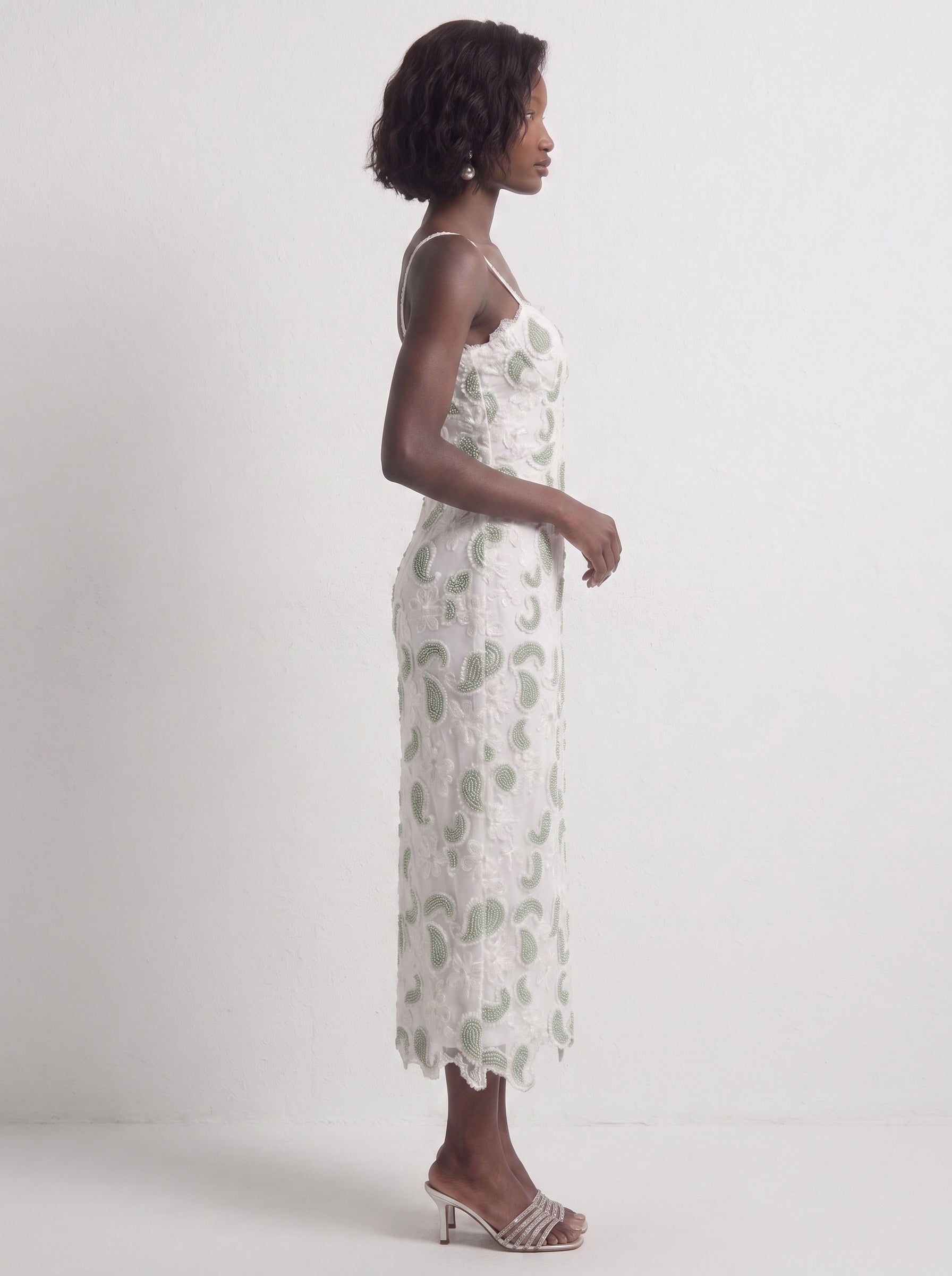<img src="https://www.berynea.com/" 
       alt="  Spaghetti Strap Embroidered Lace Midi Dress 
       loading="lazy" />