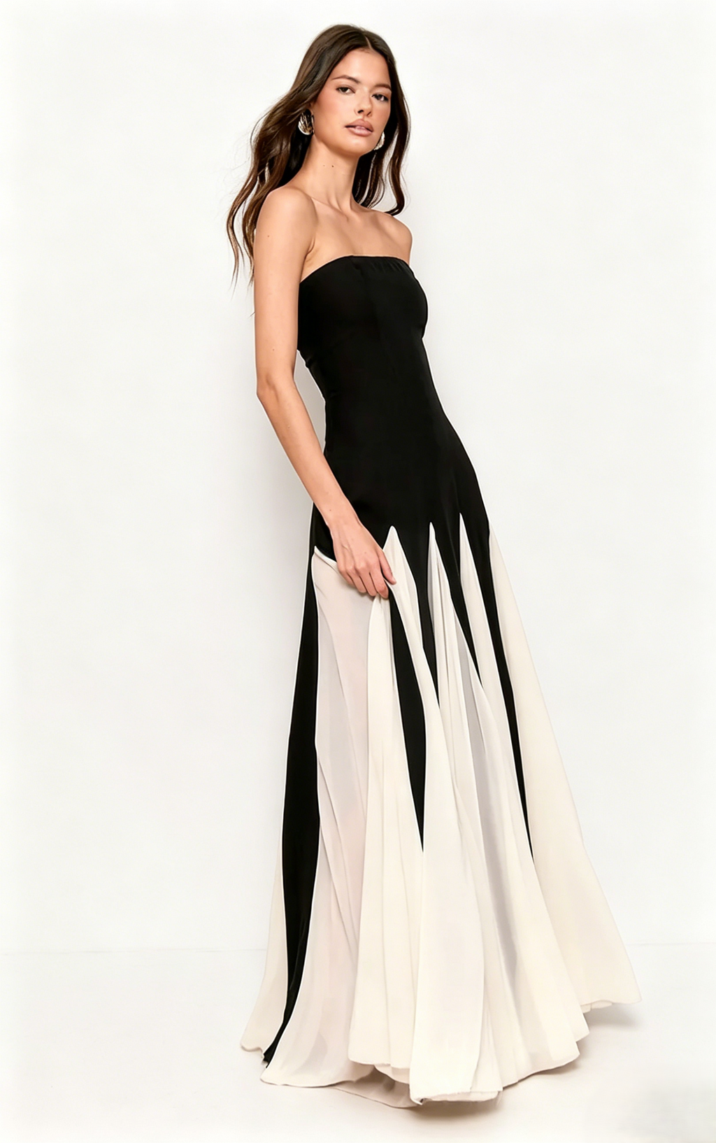 <img src="https://www.beryn-boutique.com/" 
       alt="Black and White Color  A-Line Spliced Maxi Dress" 
       loading="lazy" />