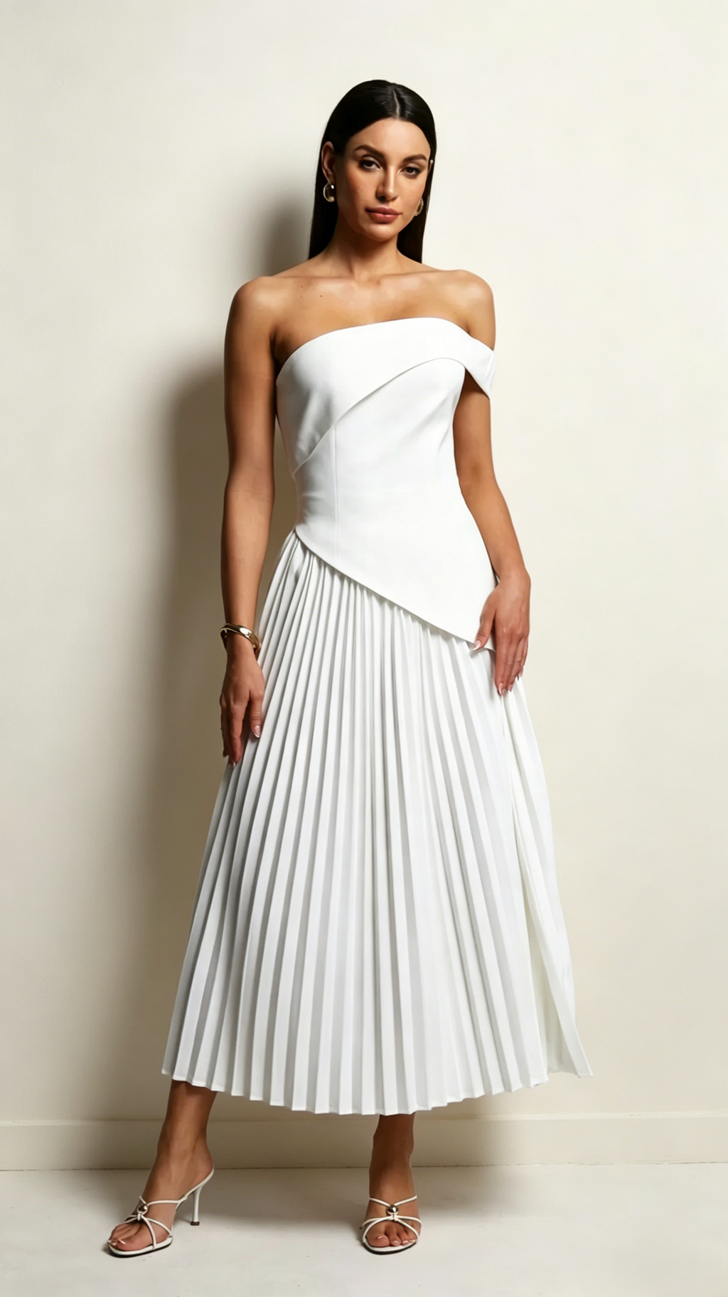 <img src="https://www.beryn-boutique.com/" 
       alt="Off Shoulder Asymmetrical  Pleated Midi Dress" 
       loading="lazy" />