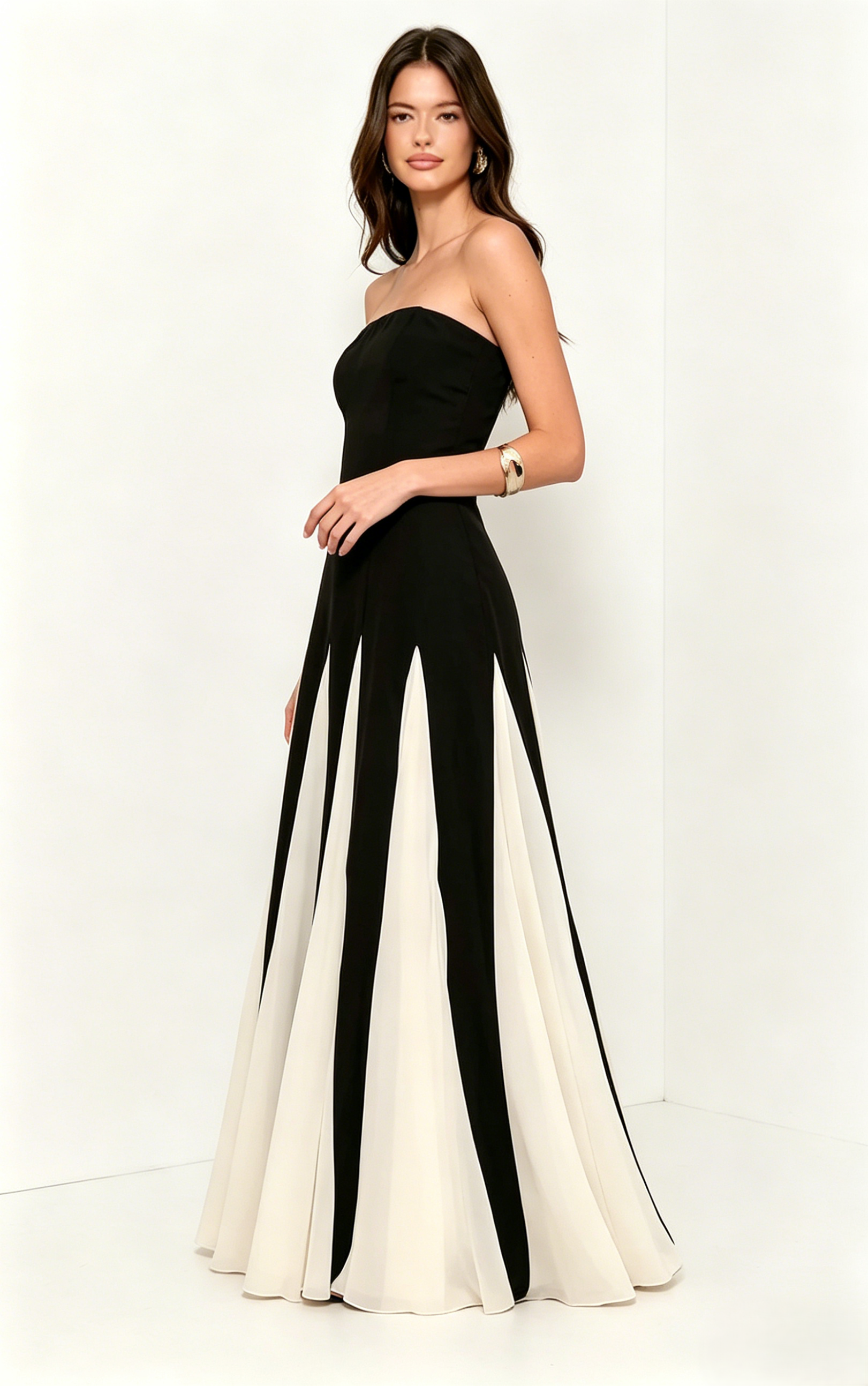 <img src="https://www.beryn-boutique.com/" 
       alt="Black and White Color  A-Line Spliced Maxi Dress" 
       loading="lazy" />