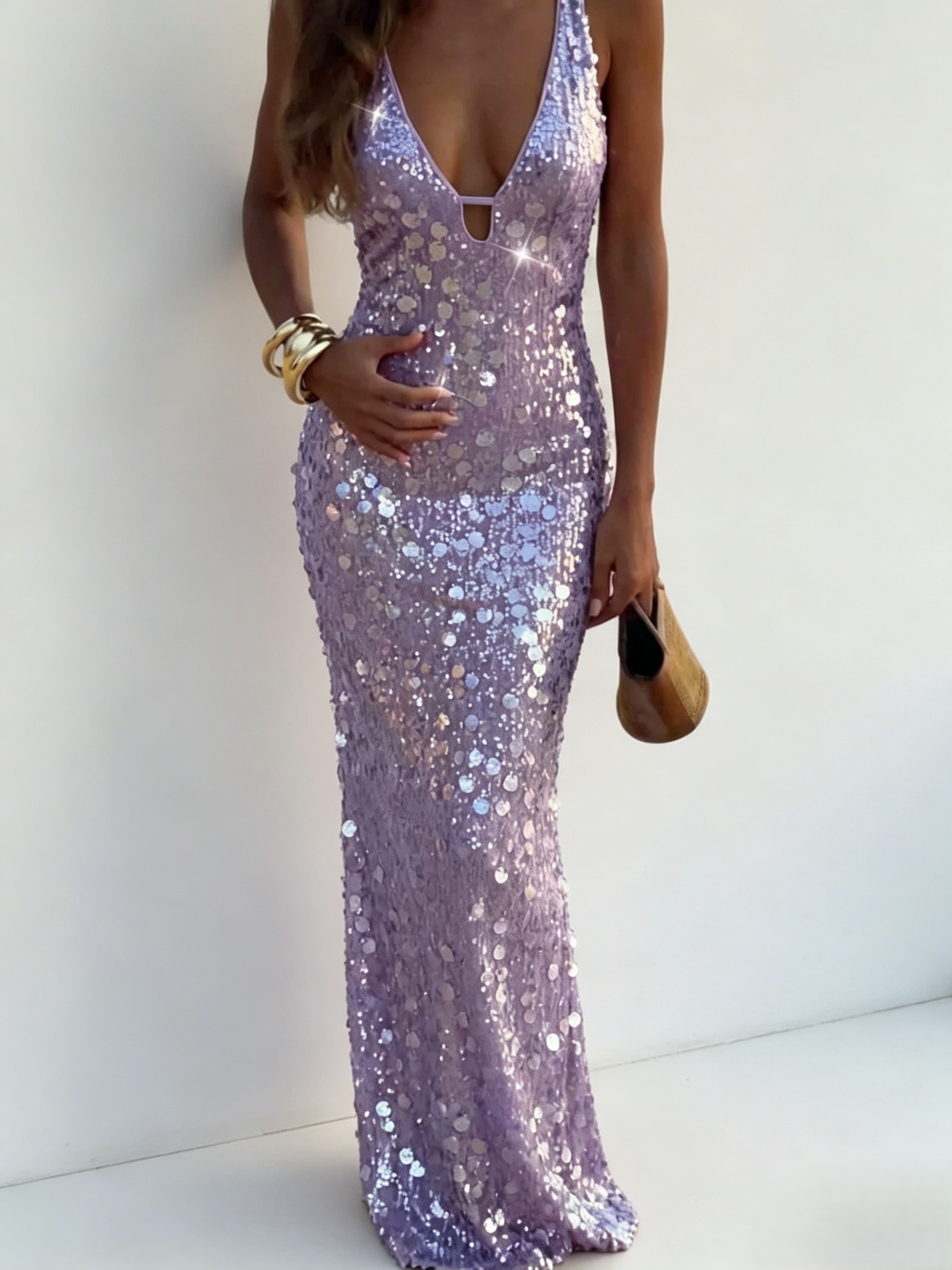 <img src="https://www.beryn-boutique.com/" 
       alt="Purple Sequin Spaghetti Strap Maxi Dress" 
       loading="lazy" />
