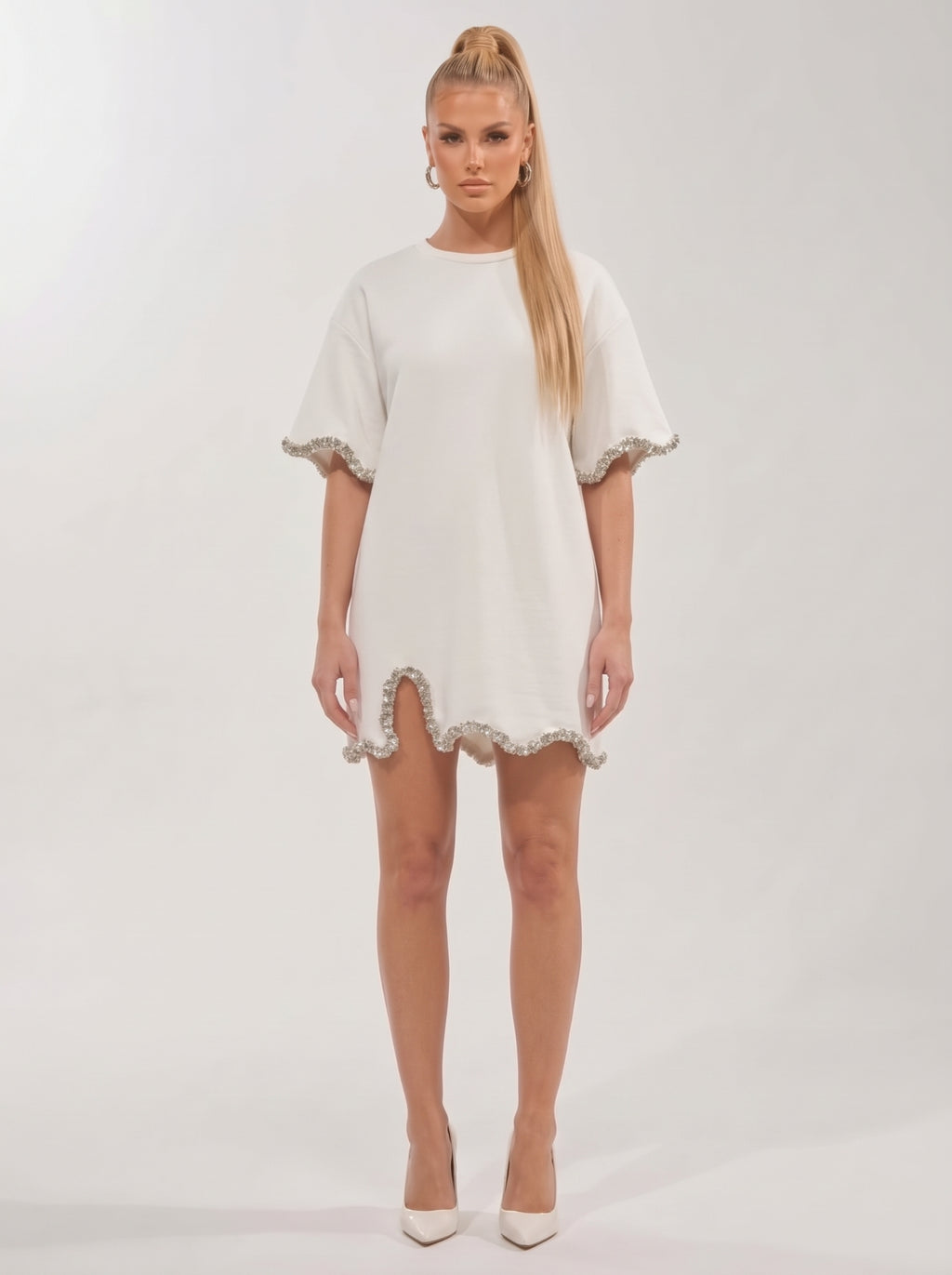 <img src="https://www.berynea.com/" 
       alt="White Embellished T-Shirt Mini Dress with Silver Trim="lazy" />