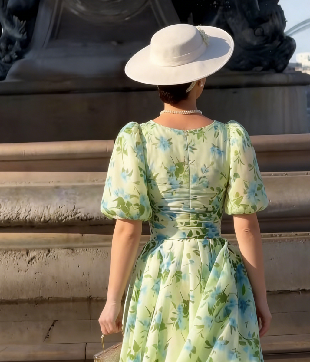 <img src="https://www.beryn-boutique.com/" 
       alt="Vintage Inspired Green Floral Chiffon Midi Dress | Luxury Puff Sleeve Evening Gown" 
       loading="lazy" />