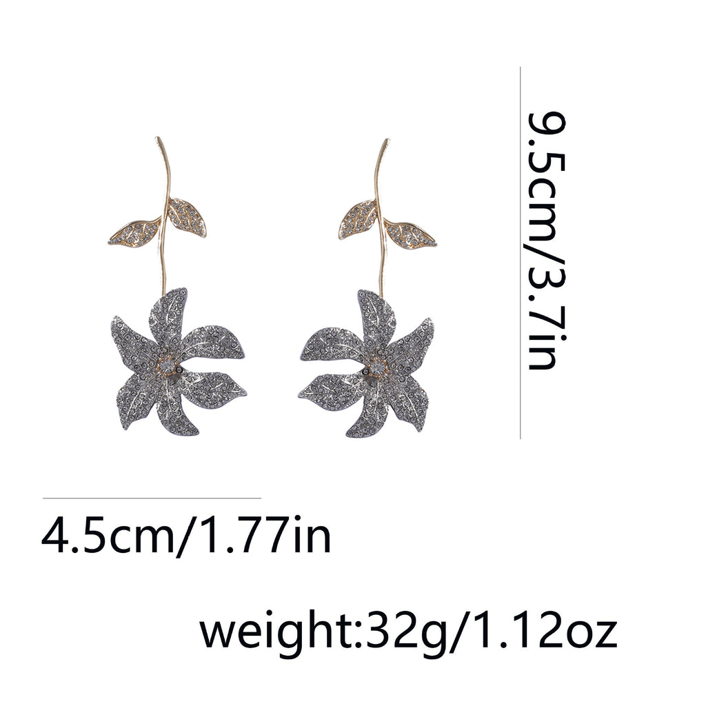 <a href="https://beryn-boutique.com/dress">
<img src="xxx.jpg" alt=<"Dainty High-end Pearl Inlaid Elegant Versatile  Flower Earrings">
</a>
