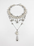 < img src="https://www.berynea.com/" 
       alt="Layered Pearl & Silver Teardrop Necklace | Elegant Wedding Bridal Jewelry | Berynea" 
       loading="lazy" />