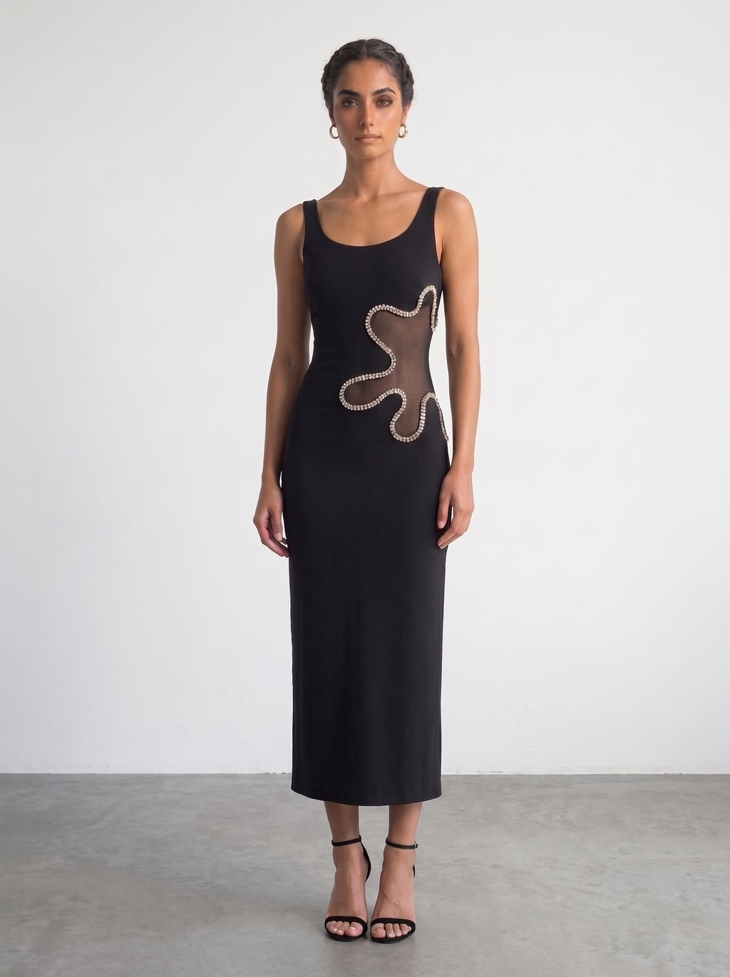 <img src="https://www.berynea.com/" 
       alt="Black Mesh Cutout Maxi Dress with Rhinestone" 
       loading="lazy" />