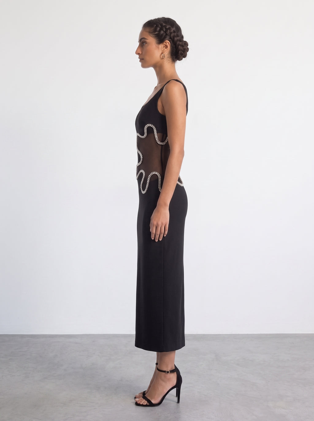 <img src="https://www.berynea.com/" 
       alt="Black Mesh Cutout Maxi Dress with Rhinestone" 
       loading="lazy" />