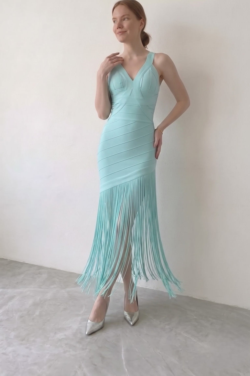 
< img src="https://www.berynea.com/" 
       alt="Mint Blue Deep V Fringe Bandage Maxi Dress | Sleeveless Tassel Bodycon Evening Gown" 
       loading="lazy" />