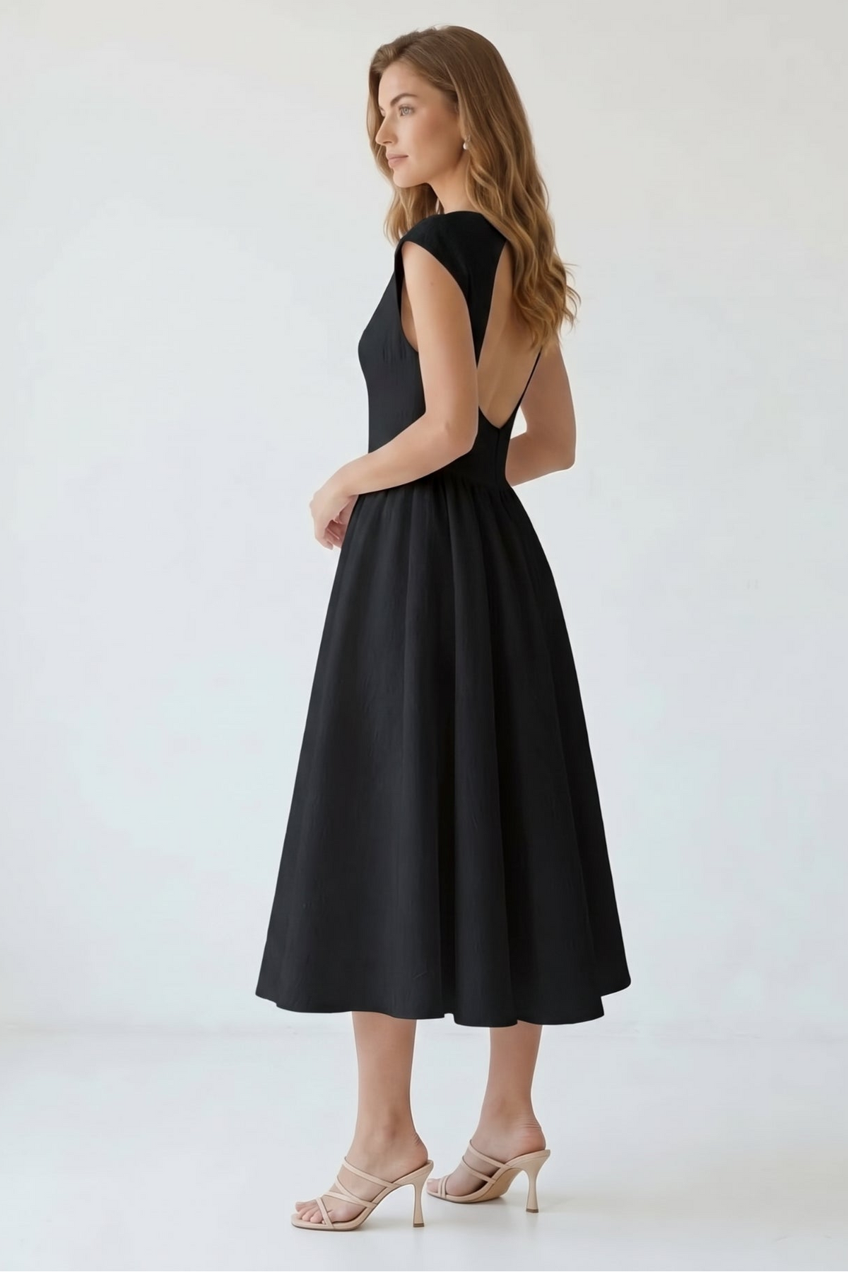 
<img src="https://www.berynea.com/" 
       alt="Black Boat Neck Cap Sleeve A-Line Midi Dress="lazy" />