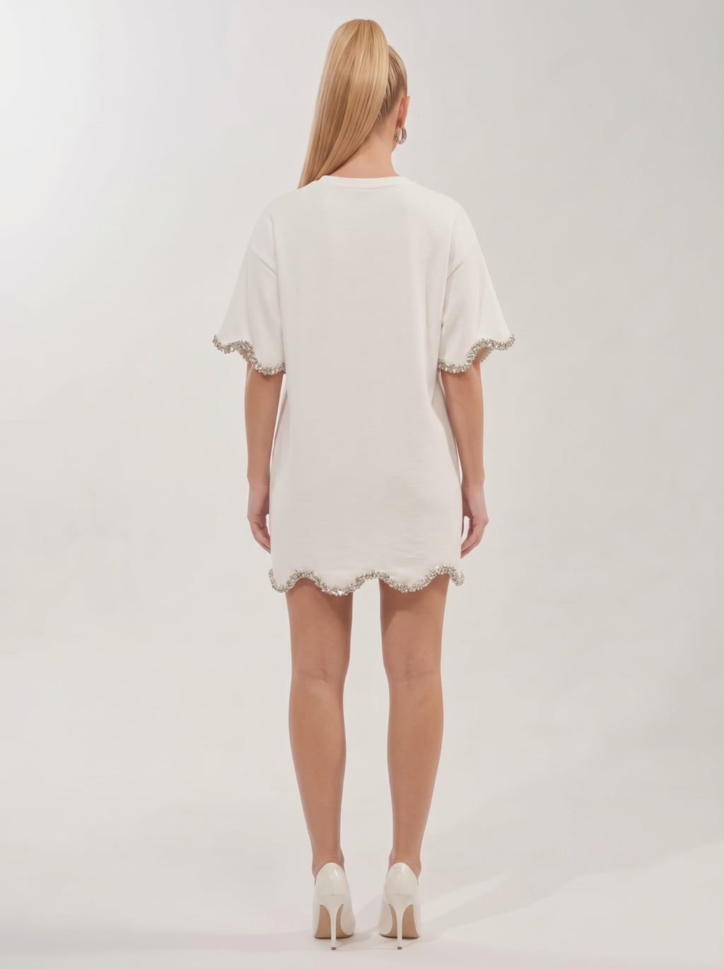 <img src="https://www.berynea.com/" 
       alt="White Embellished T-Shirt Mini Dress with Silver Trim="lazy" />