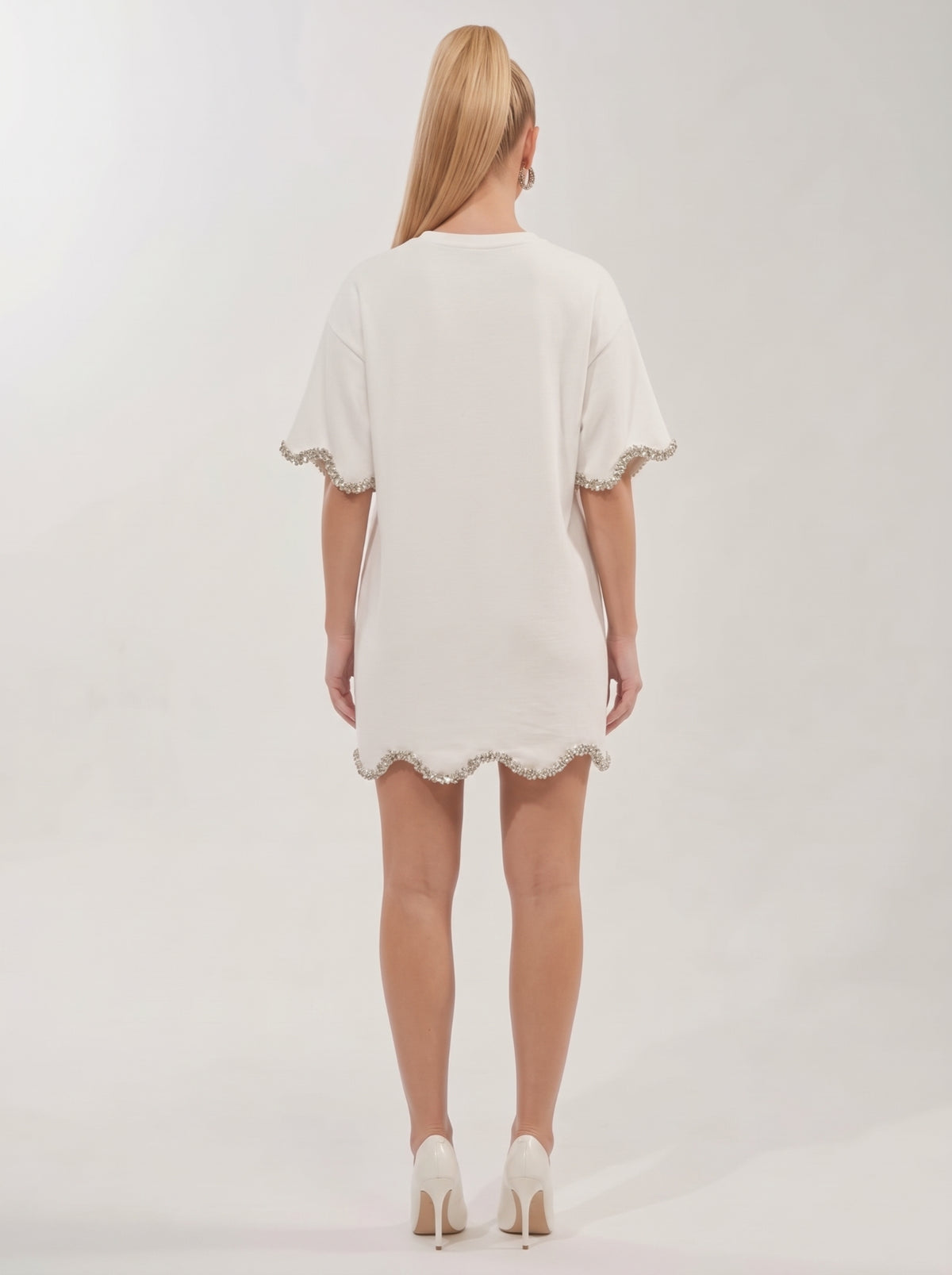 <img src="https://www.berynea.com/" 
       alt="White Embellished T-Shirt Mini Dress with Silver Trim="lazy" />
