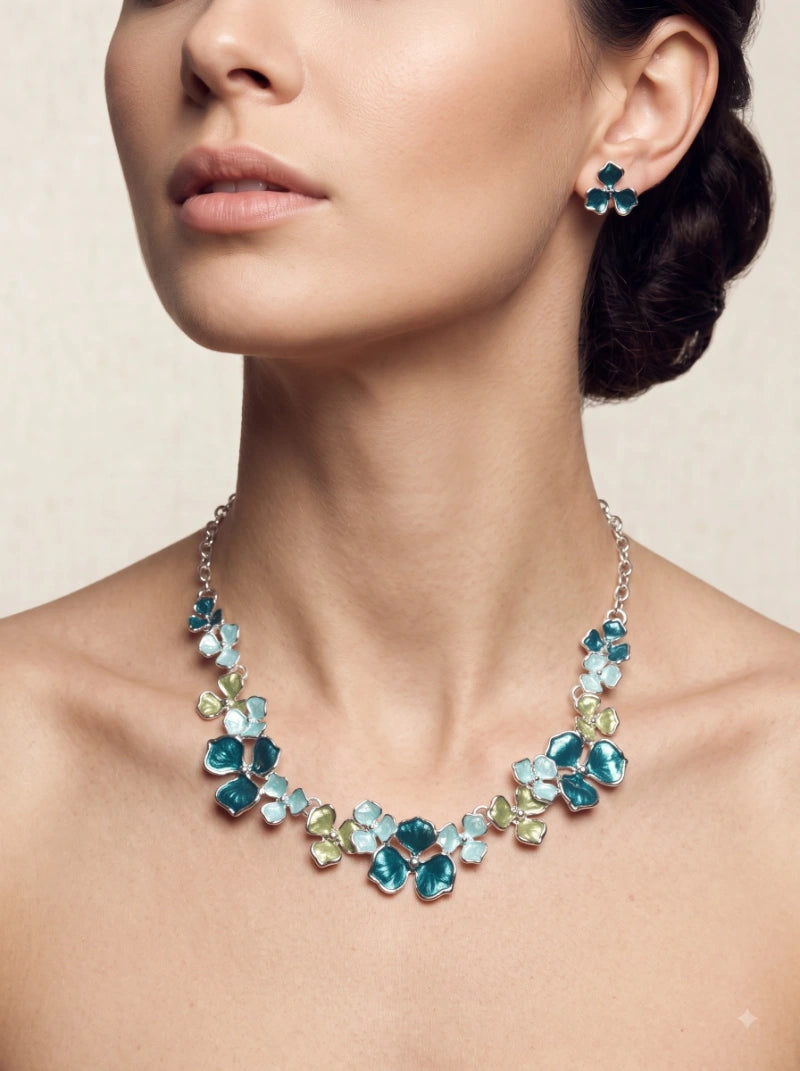 
< img src="https://www.berynea.com/" 
       alt="Teal Enamel Floral Necklace & Earring Set | Botanical Statement Jewelry" 
       loading="lazy" />