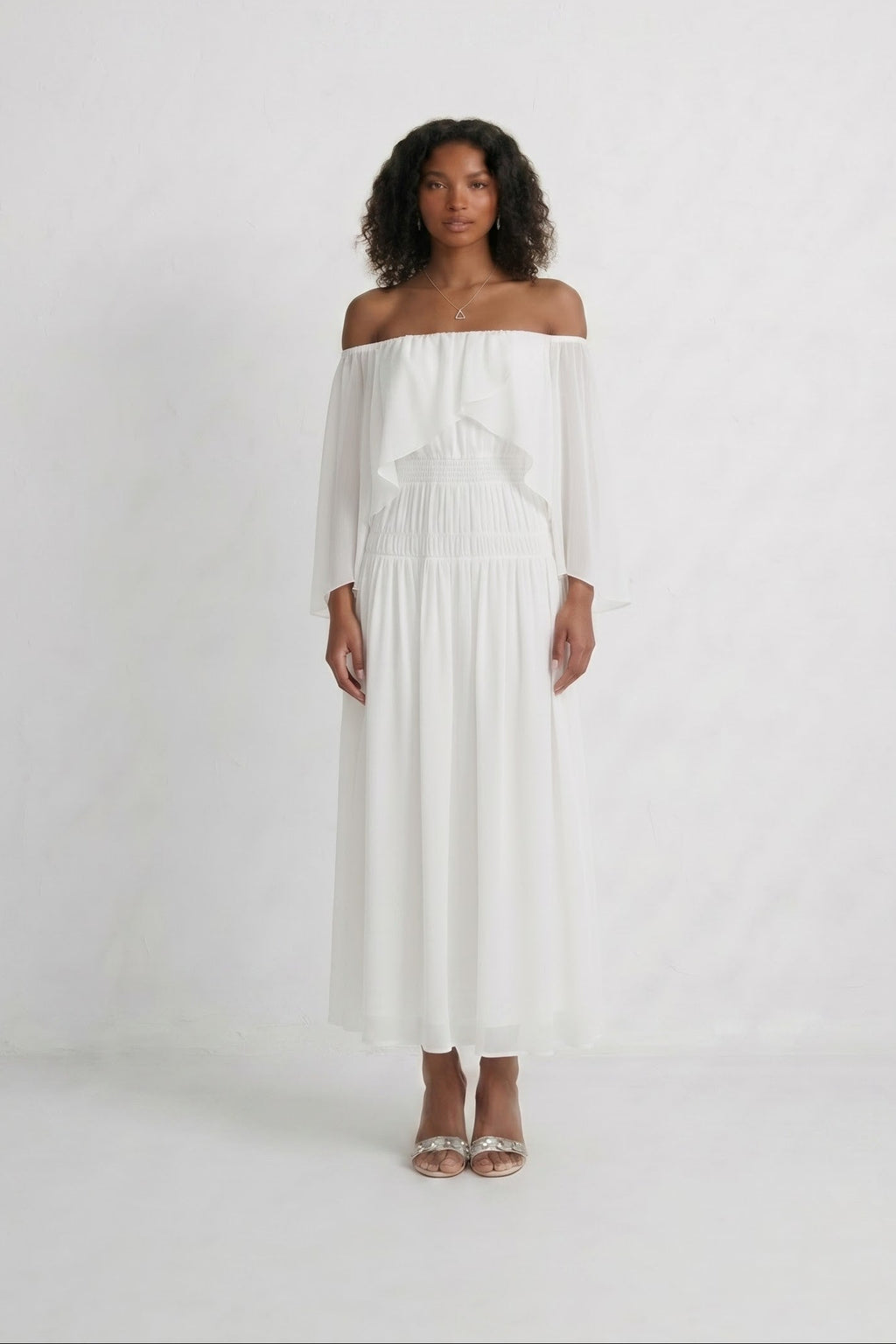 <img src="https://www.beryn-boutique.com/" 
       alt="White Off-Shoulder Long Sleeve Chiffon Maxi Dress | Elegant Bridal Wedding Gown" 
       loading="lazy" />