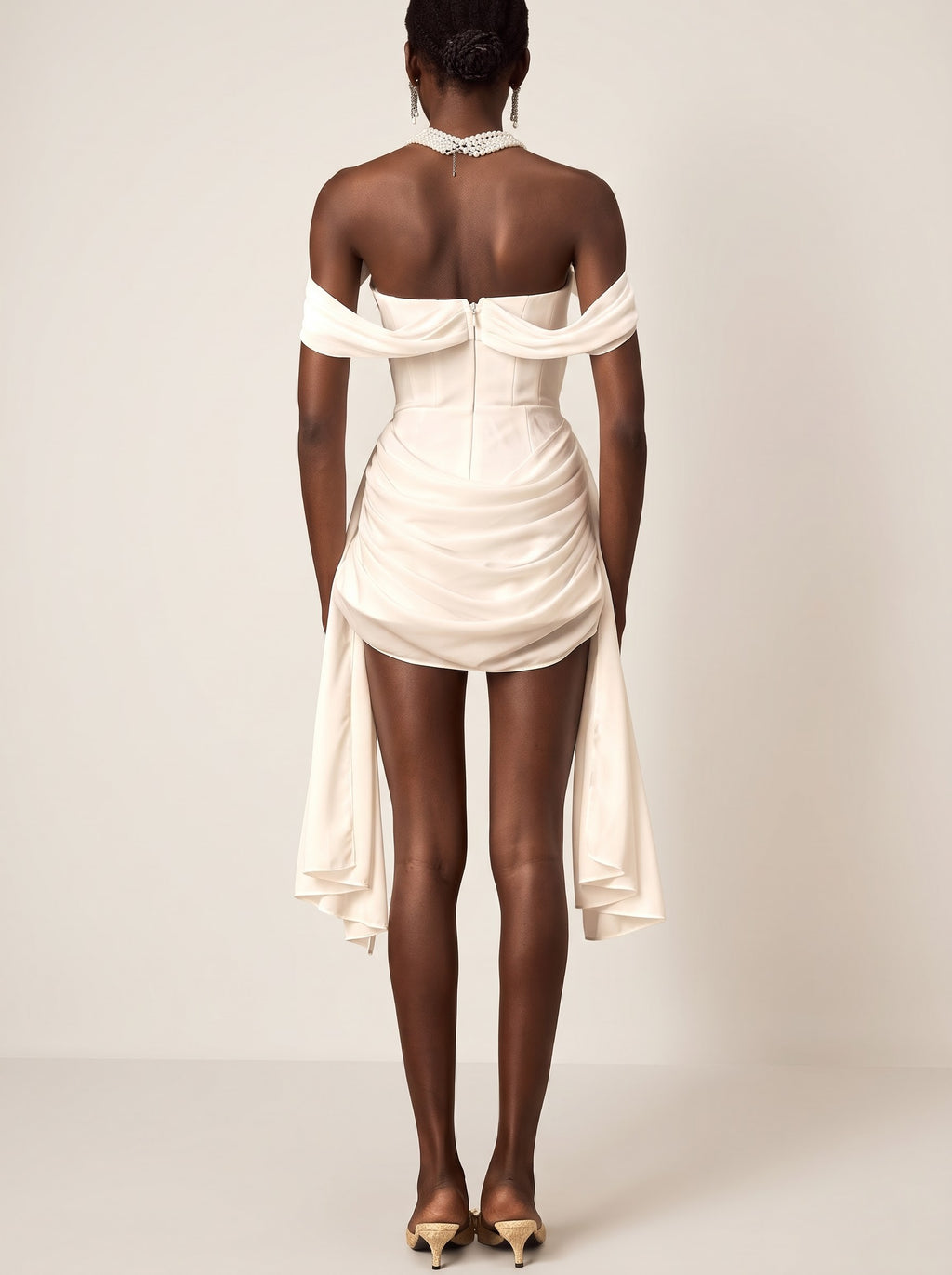 Miniabito in chiffon bianco plissettato